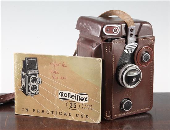 A Rolleiflex 3.5 Planar Xenotar camera and instruction book